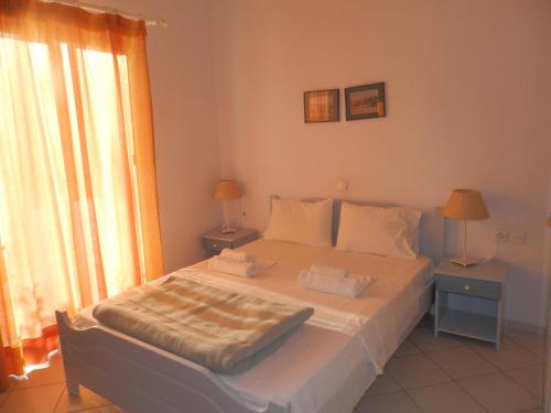 Postel nebo postele na pokoji v ubytování Silvi Mari Apartments