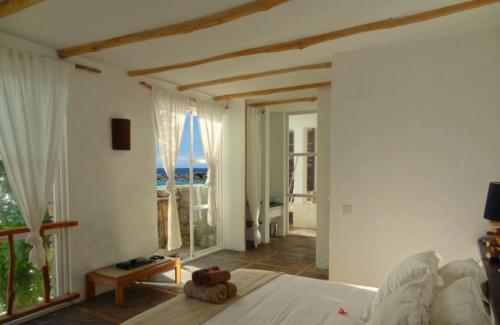 Bliss Boutique Hotel Seychellesにあるベッド
