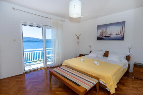 Posteľ alebo postele v izbe v ubytovaní STRANDHAUS Vesna WG 1