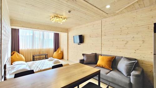Postel nebo postele na pokoji v ubytování New Gudauri 312