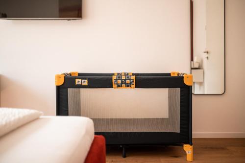 Postel nebo postele na pokoji v ubytování Central Suite Meran