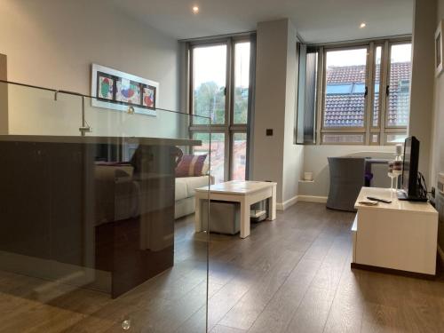 A seating area at Apartamento - Riba De Sella
