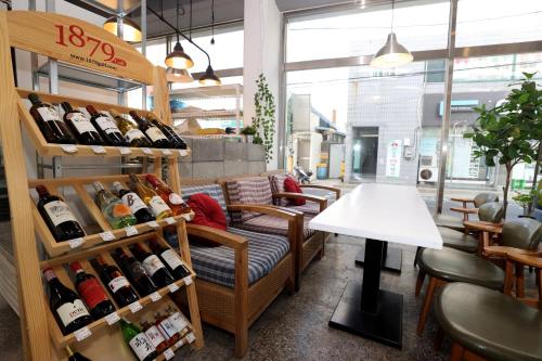 a wine store with a display of wine bottles at Pohang Youngildae Guesthouse in Pohang
