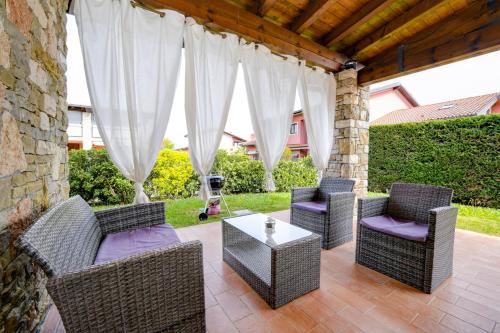 Area soggiorno di Gardaliva - Home & Garden by Garda FeWo