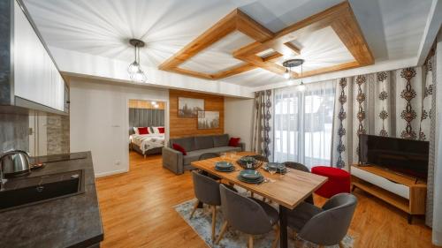 Posedenie v ubytovaní Apartamenty Sun & Snow Resorts F Białka Tatrzańska z sauną