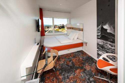 Letto o letti in una camera di HHE Express