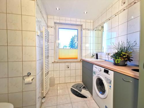 Ένα μπάνιο στο Ferienwohnung "Rosental"