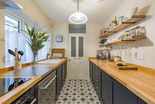 Kuchyň nebo kuchyňský kout v ubytování Star Cottage