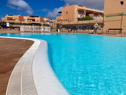 Precioso apto 4 pers, 2 piscinas, fibra óptica