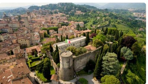 an aerial view of a city with a castle at B&B Sotto le Mura in Bergamo
