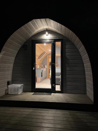 an entrance to a room with an open door at Glamping Pods in Milngavie