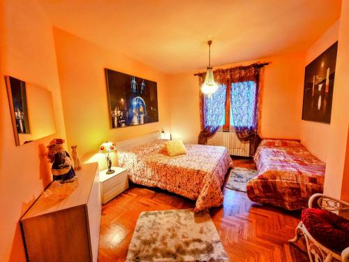 Postel nebo postele na pokoji v ubytování B&B Margot