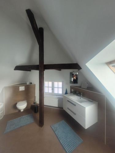 Postel nebo postele na pokoji v ubytování studio 50m2 au bord de l'eau à STRASBOURG