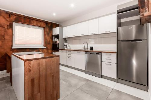 Kuchyň nebo kuchyňský kout v ubytování Apartamenty koło Szczyrku A&S Spa - basen, jacuzzi, sauna