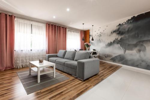 Posezení v ubytování Apartamenty koło Szczyrku A&S Spa - basen, jacuzzi, sauna
