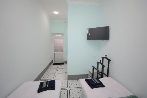 TV a/nebo společenská místnost v ubytování Hotel S & D Hostel