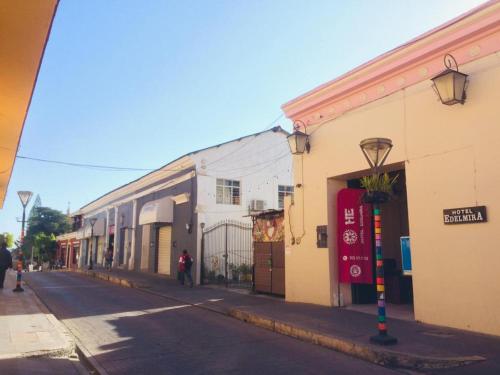 a street with buildings on the side of a street at HOTEL EDELMIRA in Comitán de Domínguez
