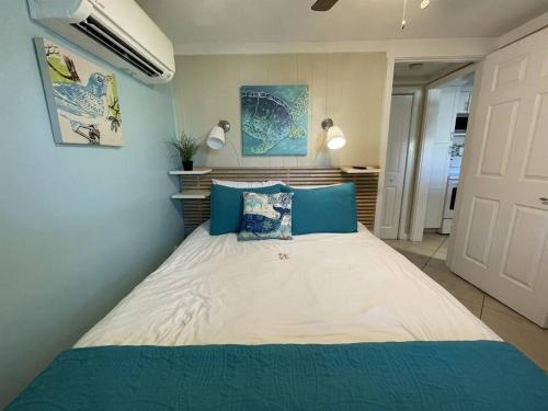 Ένα ή περισσότερα κρεβάτια σε δωμάτιο στο The StarFish Bungalow 1B/1B