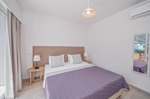 Una cama o camas en una habitación de Maria Rousse
