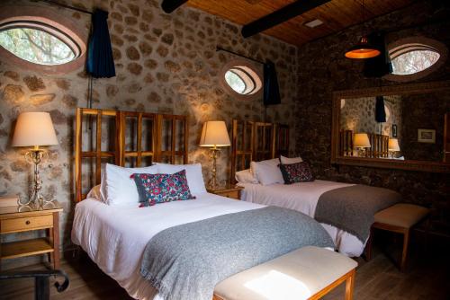 Ένα ή περισσότερα κρεβάτια σε δωμάτιο στο Nirvana Restaurant & Retreat