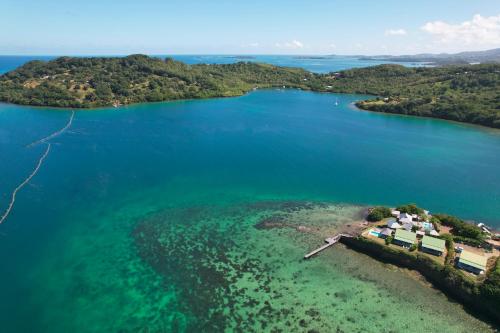 an island in the middle of a body of water at EAST KEYS - Lucy's Bay in Hyacinthe