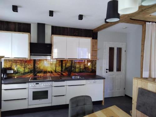 Kuchyň nebo kuchyňský kout v ubytování Martins Comfort Appartement