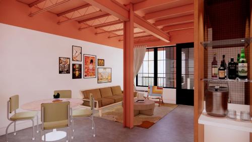 a living room with a couch and a table at The Myriad Hotel in Louisville