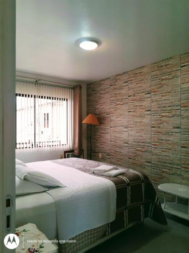 Katil atau katil-katil dalam bilik di Hotel Vila Germânica
