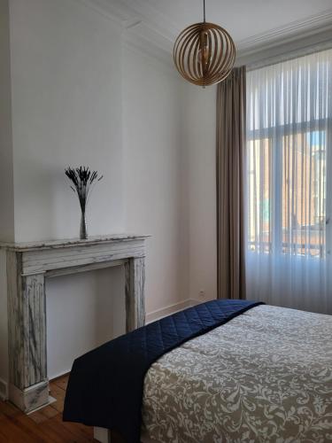 Postel nebo postele na pokoji v ubytování Brussels Bed & Blockchain Private rooms with shared bathroom