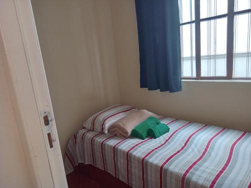 En eller flere senge i et værelse på POUSADA CASA NOSTRA