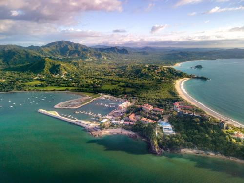 an aerial view of a beach and the ocean at Dunama Hotel in Playa Flamingo