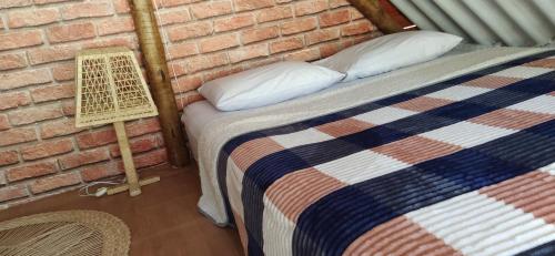 Bangalô próximo ao Parque tesisinde bir odada yatak veya yataklar