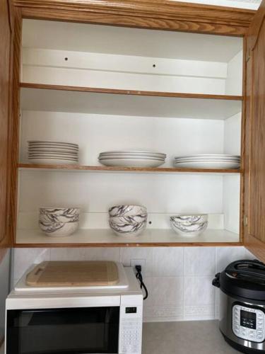 Kuchyň nebo kuchyňský kout v ubytování Cozy Home
