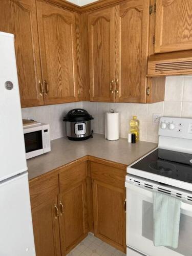 Kuchyň nebo kuchyňský kout v ubytování Cozy Home
