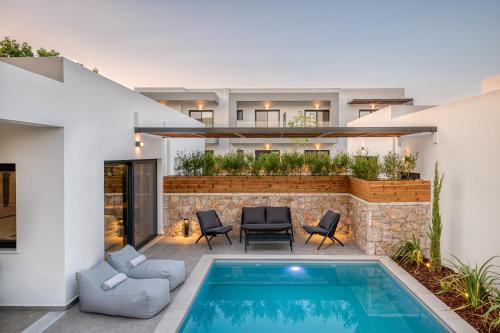 an image of a house with a swimming pool at Sezian Boutique Homes and Villas in Preveza