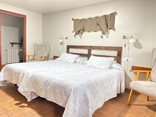 Postel nebo postele na pokoji v ubytování Casa Sara