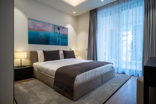 Postel nebo postele na pokoji v ubytování Paloma Apartment - Portonovi Resort