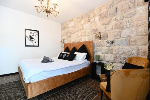 Tempat tidur dalam kamar di Villa Confita