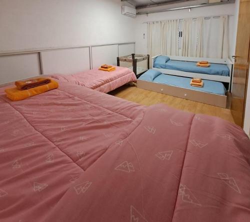 מיטה או מיטות בחדר ב-Lo de Lidia