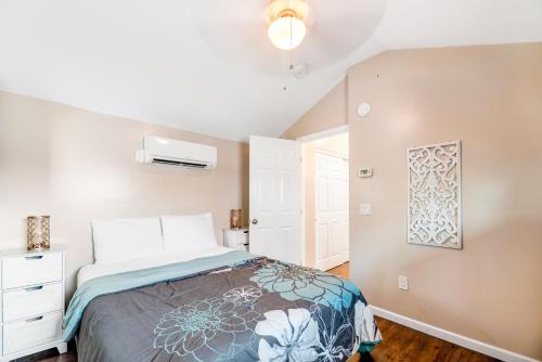 a bedroom with a bed and a window at Live Laugh Lake - A in Rushville