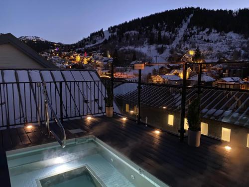 a balcony with a swimming pool on top of a building at LIFT LODGE 203 condo in Park City