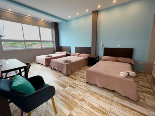 Katil atau katil-katil dalam bilik di Hotel El Meson