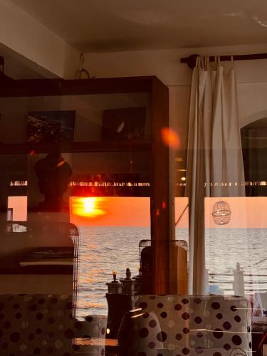 a view of the ocean from a kitchen window at Ong Huong House Can 2 in Phu Quoc