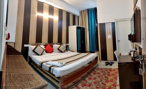 a bedroom with a bed in a room at Greno House in Greater Noida