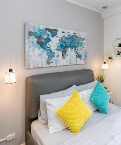 Postel nebo postele na pokoji v ubytování AMANI 729, 3 Minutes to Airport,with Gym & Pool,100mbps WiFi,Free Netflix