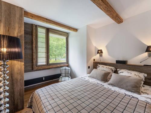 Posteľ alebo postele v izbe v ubytovaní Appartement chaleureux proche pistes de ski et golf à Megève - FR-1-569-67