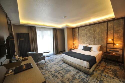 Katil atau katil-katil dalam bilik di The Alpfine Hotel