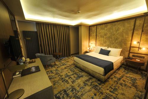 Katil atau katil-katil dalam bilik di The Alpfine Hotel
