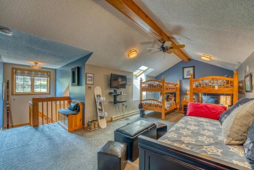 a room with two bunk beds and a couch at FC17 Stylishly renovated Forest Cottage walk to Bretton Woods ski trails wifi cable ping pong in Carroll