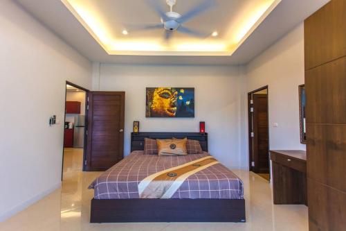 Postel nebo postele na pokoji v ubytování Baan Chang by G Estate Phuket